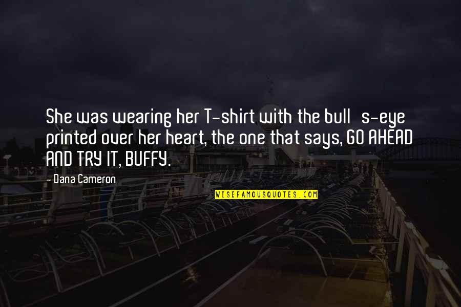 Diavolo Dance Quotes By Dana Cameron: She was wearing her T-shirt with the bull's-eye Diavolo Dance Quotes By Dana Cameron: She was wearing her T-shirt with the bull's-eye