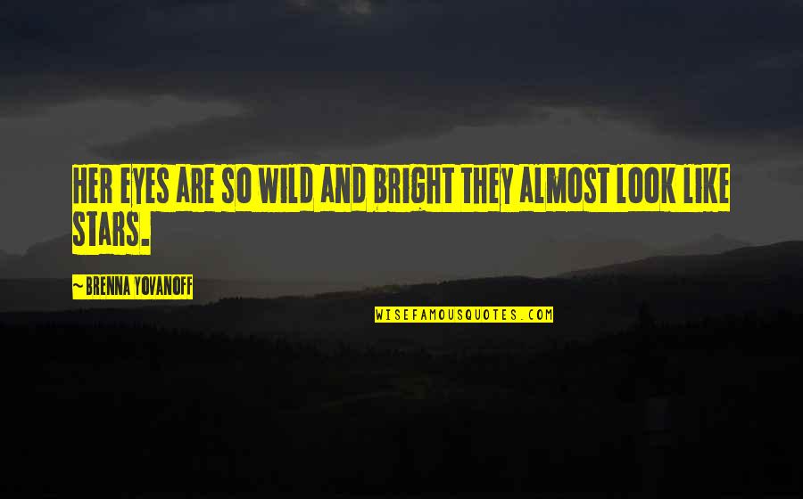 Dimitra Designs Quotes By Brenna Yovanoff: Her eyes are so wild and bright they