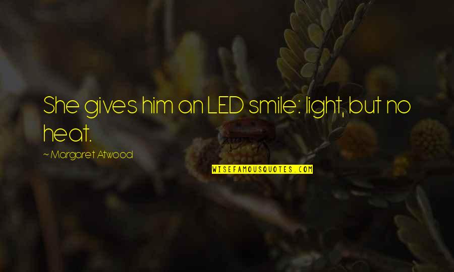 Donmadan Canli Quotes By Margaret Atwood: She gives him an LED smile: light, but Donmadan Canli Quotes By Margaret Atwood: She gives him an LED smile: light, but