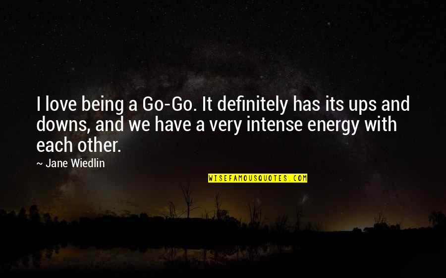 Downs Quotes By Jane Wiedlin: I love being a Go-Go. It definitely has
