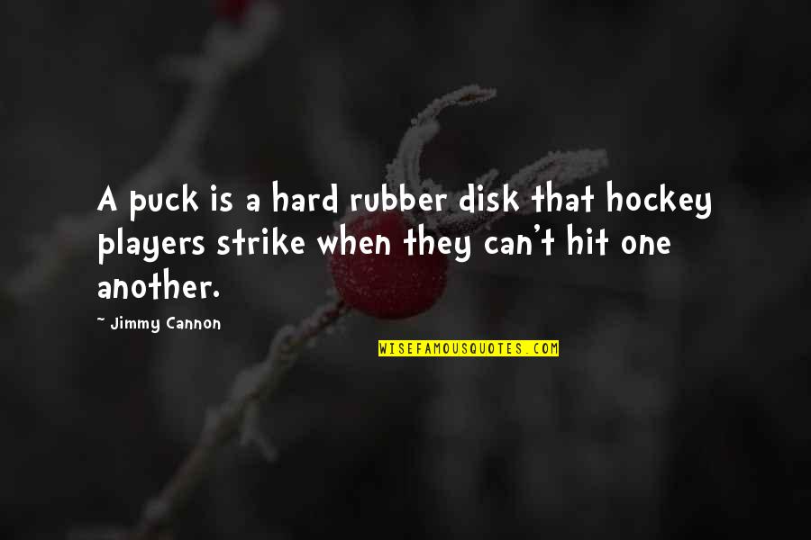 Dreamer Achiever Quotes By Jimmy Cannon: A puck is a hard rubber disk that