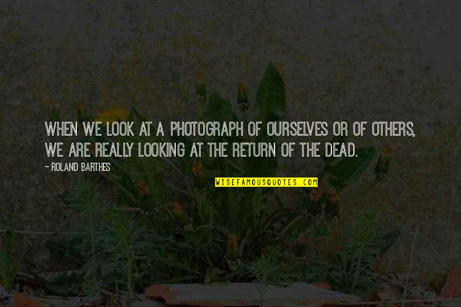 Drums Of War Quotes By Roland Barthes: When we look at a photograph of ourselves