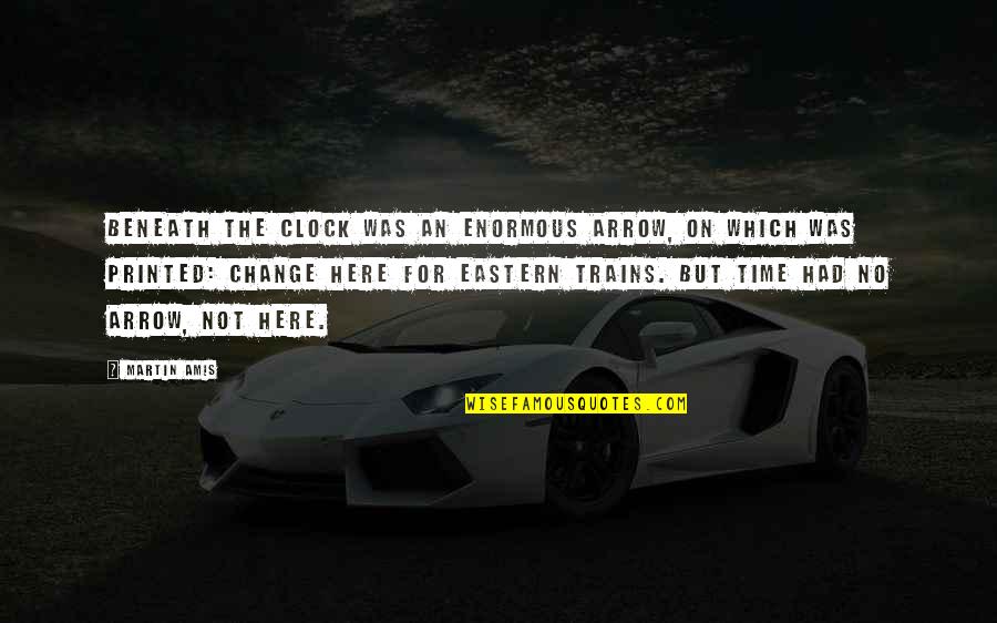 Dyoreos Quotes By Martin Amis: Beneath the clock was an enormous arrow, on Dyoreos Quotes By Martin Amis: Beneath the clock was an enormous arrow, on