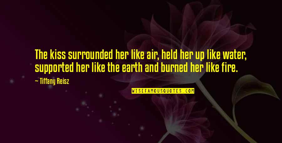 Earth And Water Quotes By Tiffany Reisz: The kiss surrounded her like air, held her