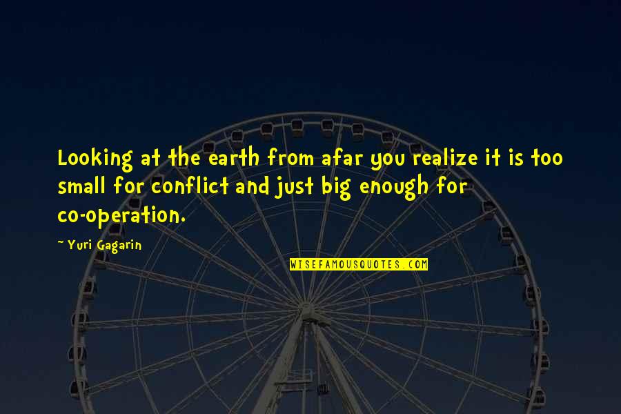 Earth Is Small Quotes By Yuri Gagarin: Looking at the earth from afar you realize