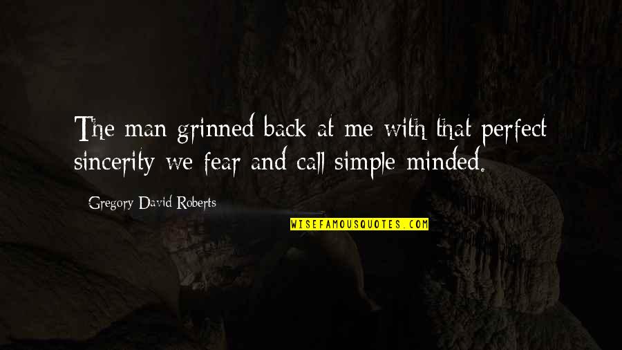 Eating Motivation Quotes By Gregory David Roberts: The man grinned back at me with that Eating Motivation Quotes By Gregory David Roberts: The man grinned back at me with that