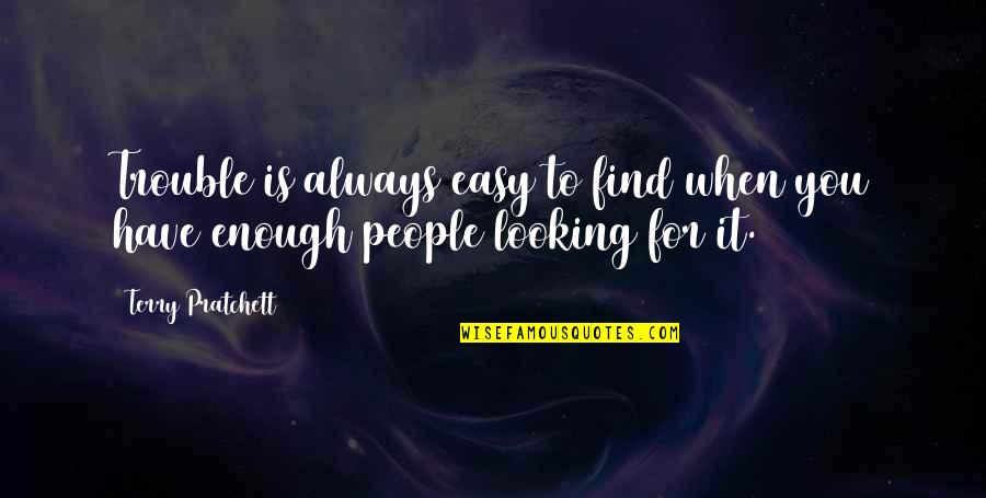 Ebony Magazine Quotes By Terry Pratchett: Trouble is always easy to find when you
