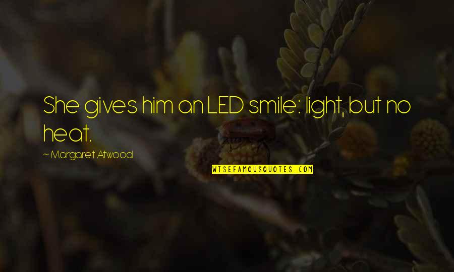 Erudity Quotes By Margaret Atwood: She gives him an LED smile: light, but