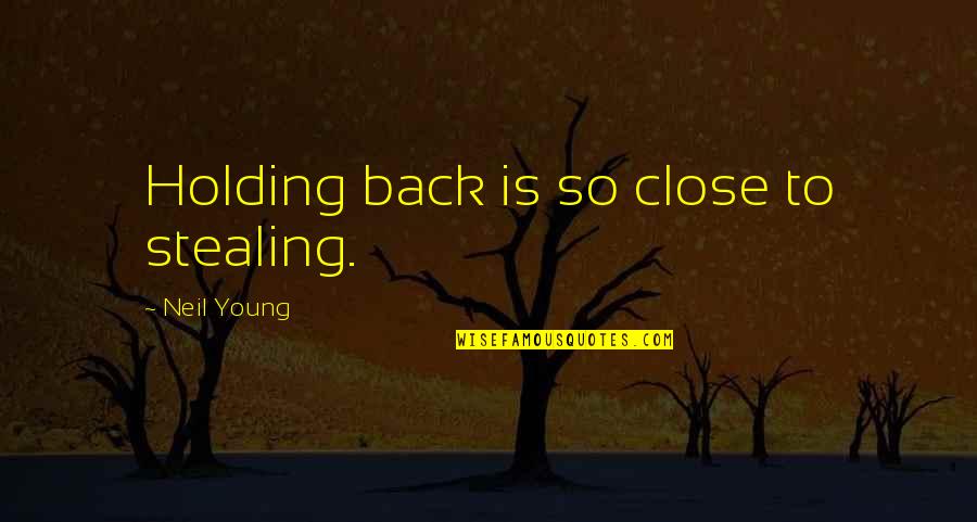 Evidence Of Evolution Quotes By Neil Young: Holding back is so close to stealing.