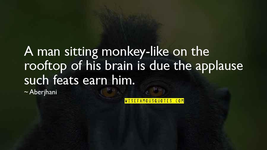 Evil Villains Quotes By Aberjhani: A man sitting monkey-like on the rooftop of