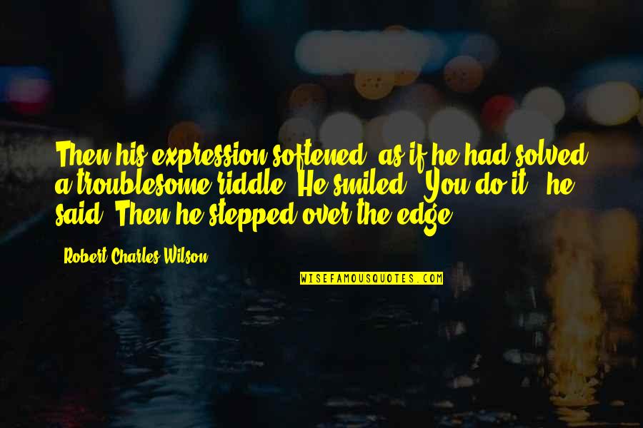 Ewangelia Tomasza Quotes By Robert Charles Wilson: Then his expression softened, as if he had