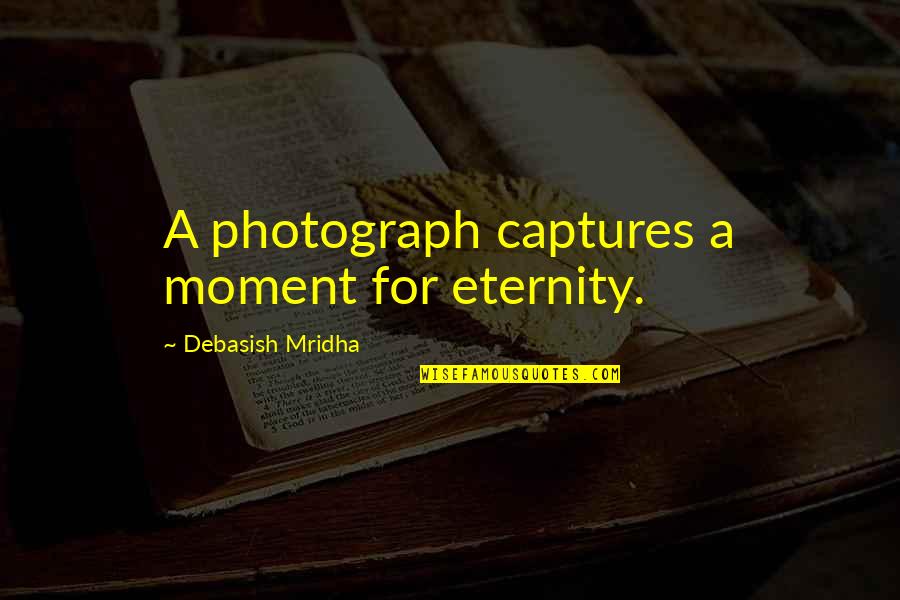 Famous Tamil Movie Love Quotes By Debasish Mridha: A photograph captures a moment for eternity.