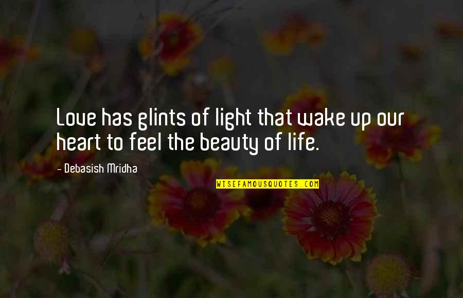 Feel The Beauty Quotes By Debasish Mridha: Love has glints of light that wake up