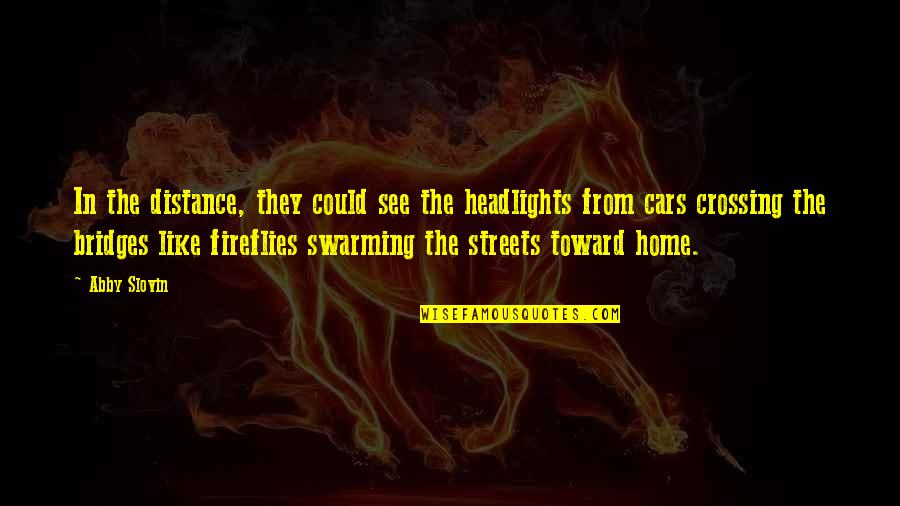 Fireflies Quotes By Abby Slovin: In the distance, they could see the headlights