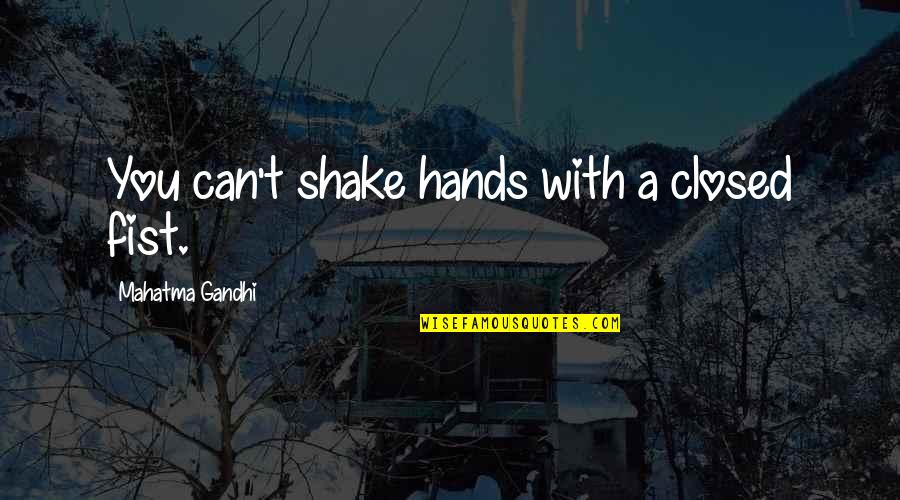 Fist Up Quotes By Mahatma Gandhi: You can't shake hands with a closed fist.