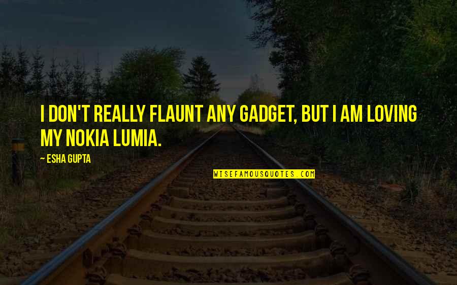 Flaunt Quotes By Esha Gupta: I don't really flaunt any gadget, but I Flaunt Quotes By Esha Gupta: I don't really flaunt any gadget, but I