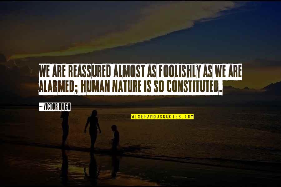 Foolishly Quotes By Victor Hugo: We are reassured almost as foolishly as we