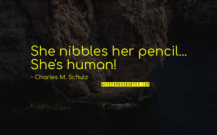 Friendship With Her Quotes By Charles M. Schulz: She nibbles her pencil... She's human!