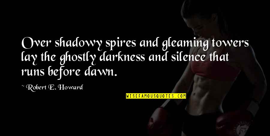 Ghostly Quotes By Robert E. Howard: Over shadowy spires and gleaming towers lay the Ghostly Quotes By Robert E. Howard: Over shadowy spires and gleaming towers lay the