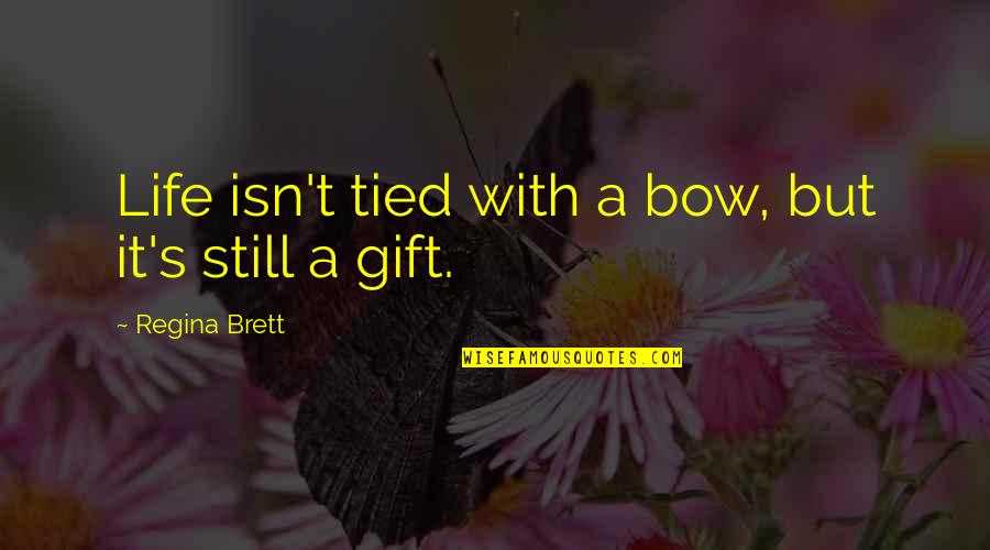 Gift Life Quotes By Regina Brett: Life isn't tied with a bow, but it's