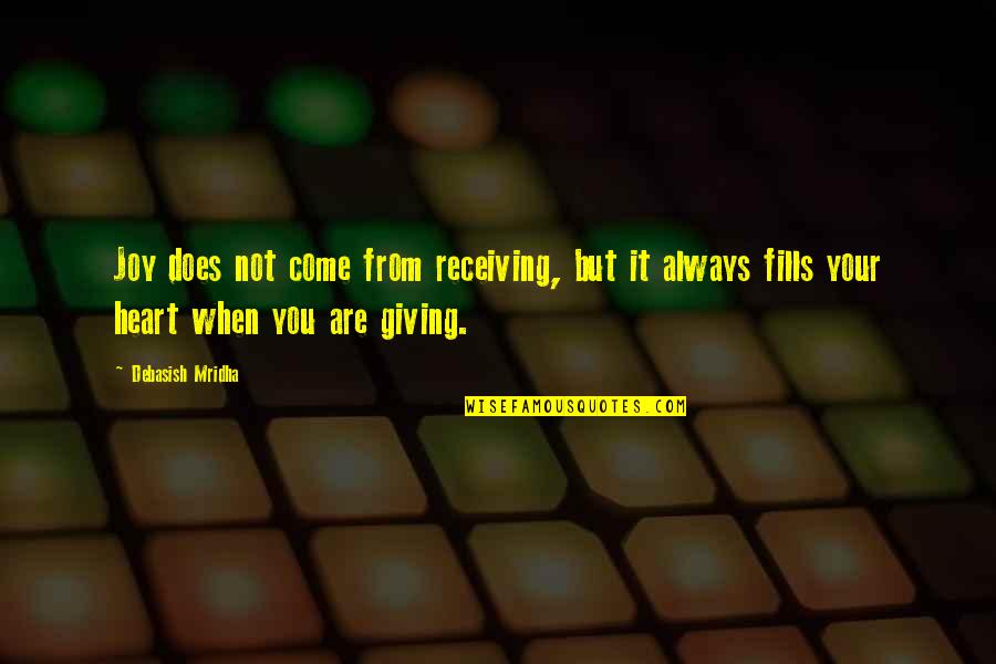 Giving From Heart Quotes By Debasish Mridha: Joy does not come from receiving, but it