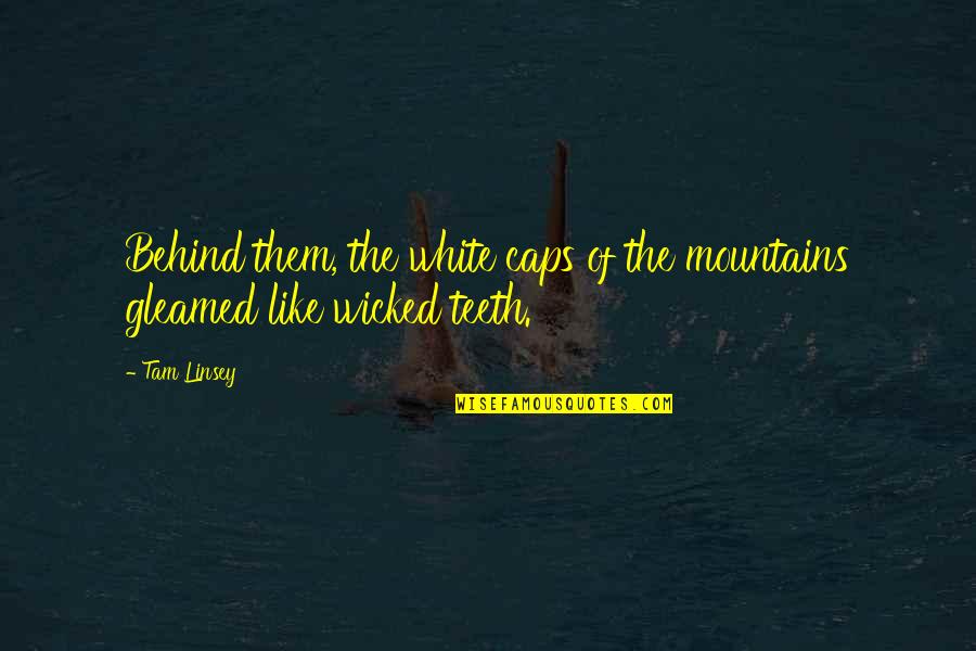 Gleamed Quotes By Tam Linsey: Behind them, the white caps of the mountains