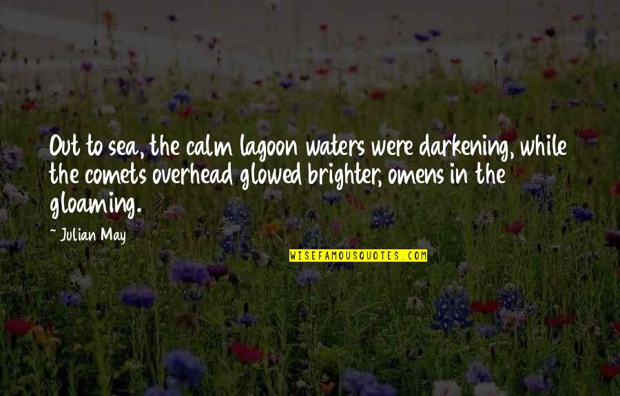 Glowed Quotes By Julian May: Out to sea, the calm lagoon waters were