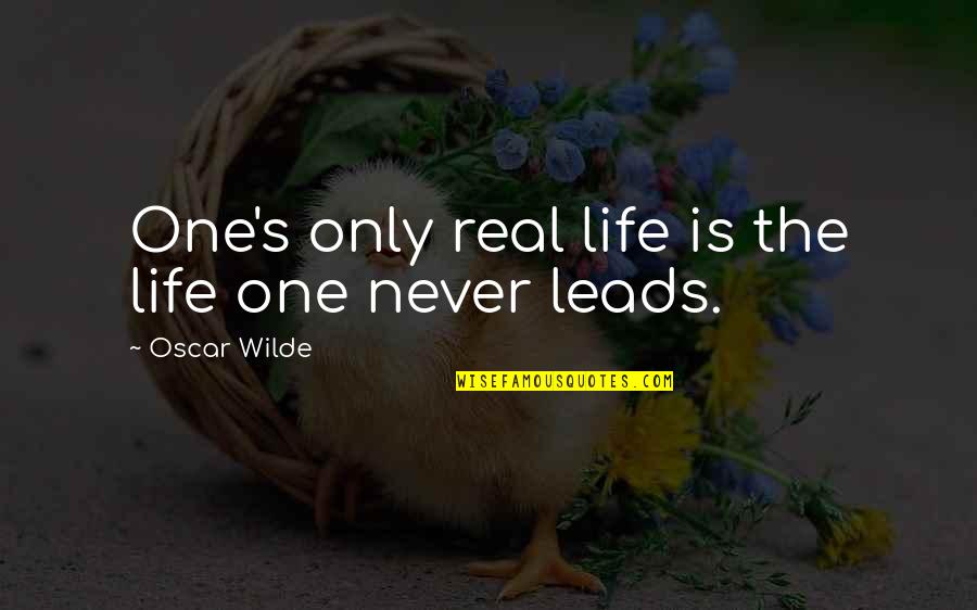 Glutei Con Quotes By Oscar Wilde: One's only real life is the life one