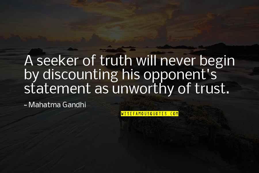 Go State Bank Quotes By Mahatma Gandhi: A seeker of truth will never begin by