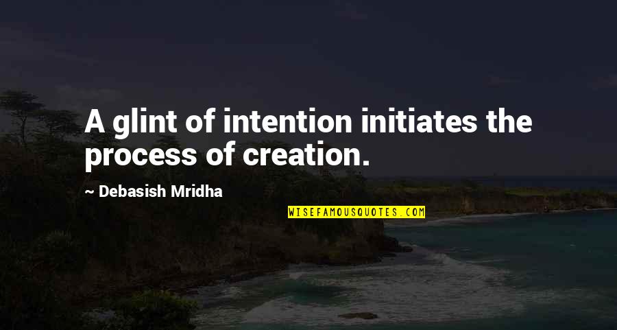 God In One Line Quotes By Debasish Mridha: A glint of intention initiates the process of