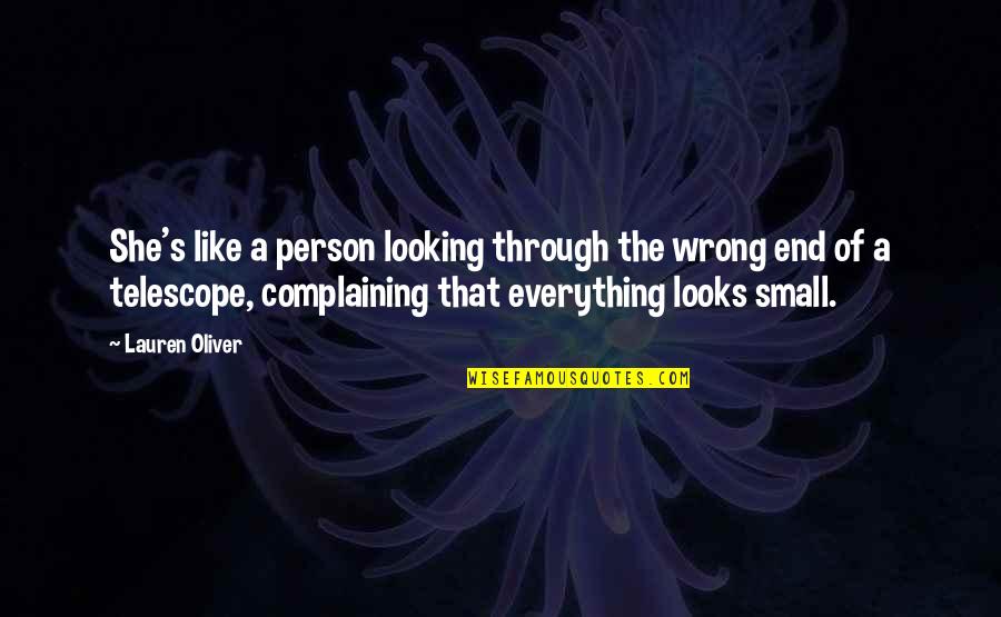 Gojri Drama Quotes By Lauren Oliver: She's like a person looking through the wrong Gojri Drama Quotes By Lauren Oliver: She's like a person looking through the wrong