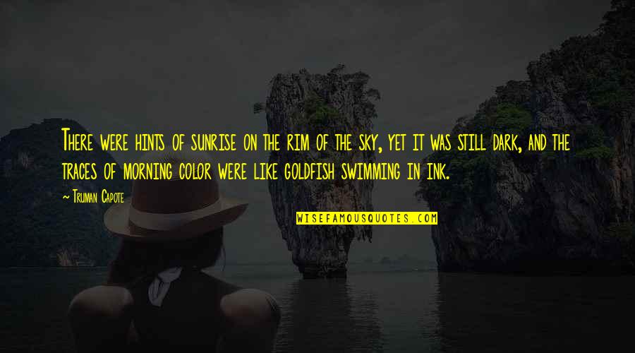 Goldfish Swimming Quotes By Truman Capote: There were hints of sunrise on the rim Goldfish Swimming Quotes By Truman Capote: There were hints of sunrise on the rim