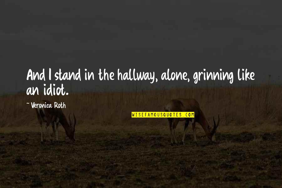 Grinning Quotes By Veronica Roth: And I stand in the hallway, alone, grinning