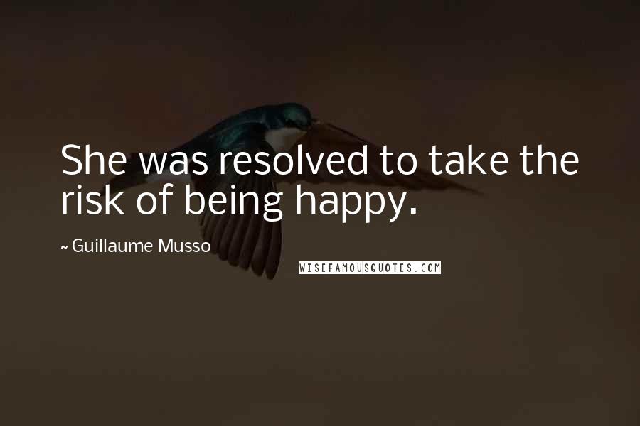 Guillaume Musso quotes: She was resolved to take the risk of being happy.