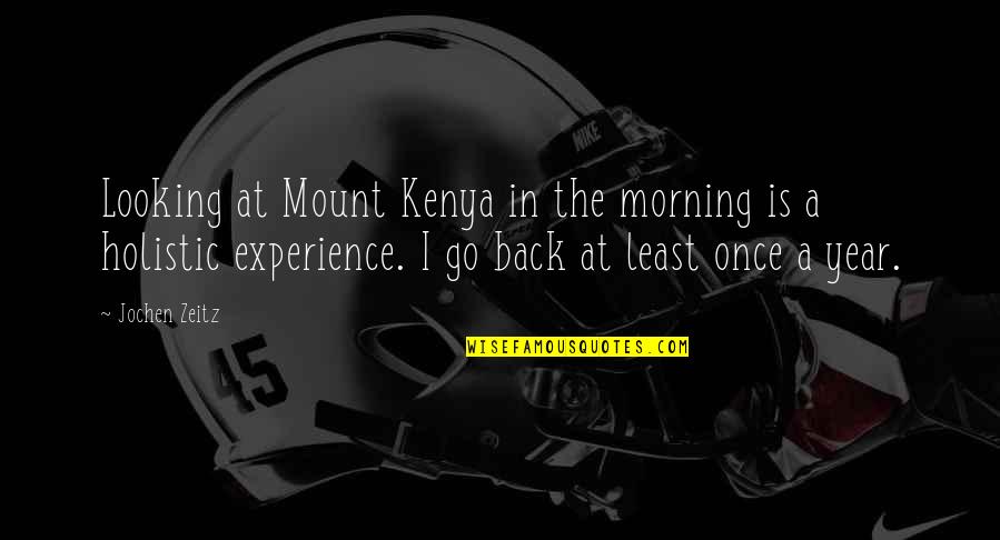 Gushed Out Quotes By Jochen Zeitz: Looking at Mount Kenya in the morning is