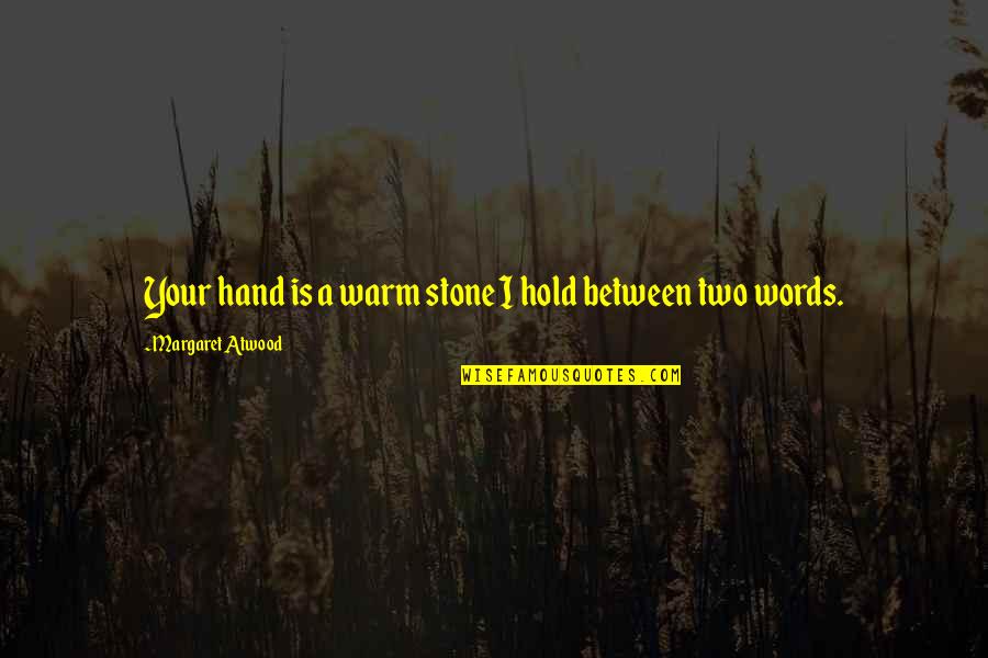 Hand Hold Quotes By Margaret Atwood: Your hand is a warm stone I hold