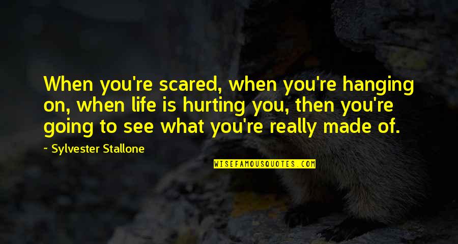 Hanging Onto Life Quotes By Sylvester Stallone: When you're scared, when you're hanging on, when