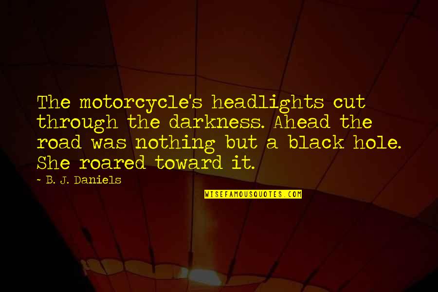 Headlights On Quotes By B. J. Daniels: The motorcycle's headlights cut through the darkness. Ahead