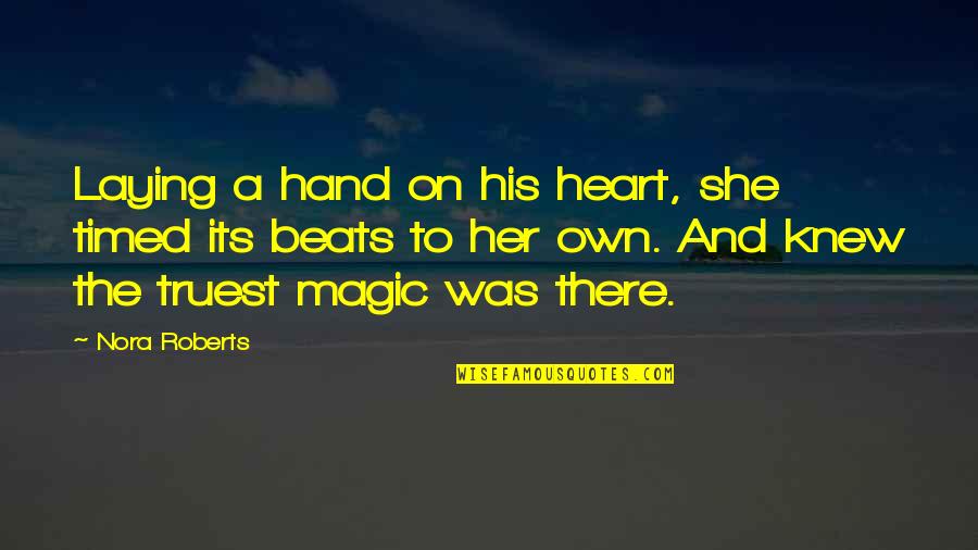 Heart Beats Love Quotes By Nora Roberts: Laying a hand on his heart, she timed