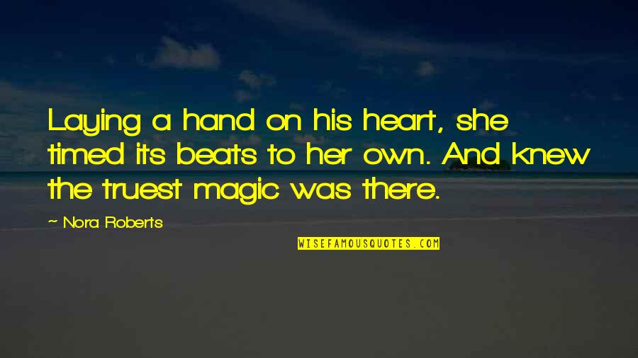 Heart Beats Love Quotes By Nora Roberts: Laying a hand on his heart, she timed Heart Beats Love Quotes By Nora Roberts: Laying a hand on his heart, she timed