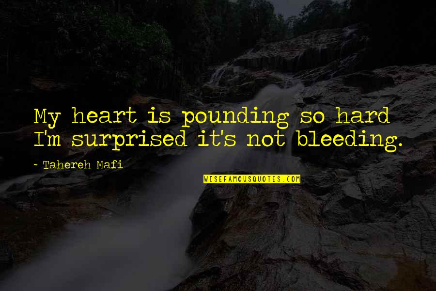 Heart Bleeding Quotes By Tahereh Mafi: My heart is pounding so hard I'm surprised