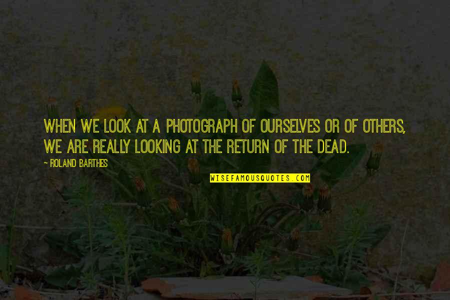 Heathcotte Quotes By Roland Barthes: When we look at a photograph of ourselves