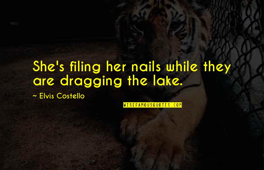 Heitmeier Vision Quotes By Elvis Costello: She's filing her nails while they are dragging