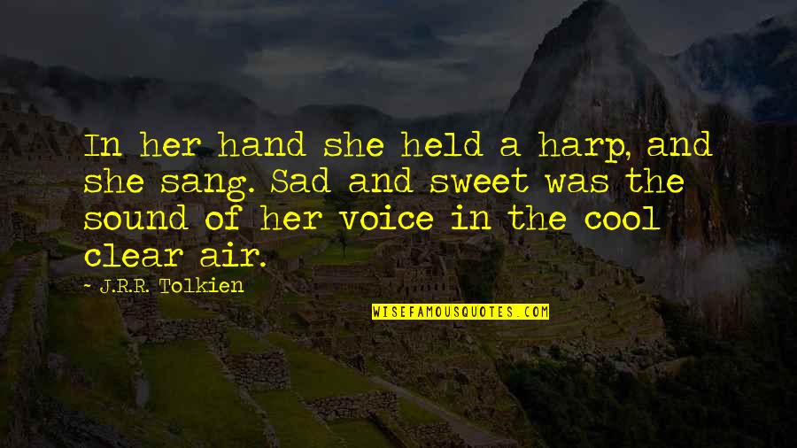 Her Sweet Voice Quotes By J.R.R. Tolkien: In her hand she held a harp, and