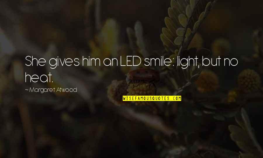 Him Smile Quotes By Margaret Atwood: She gives him an LED smile: light, but Him Smile Quotes By Margaret Atwood: She gives him an LED smile: light, but