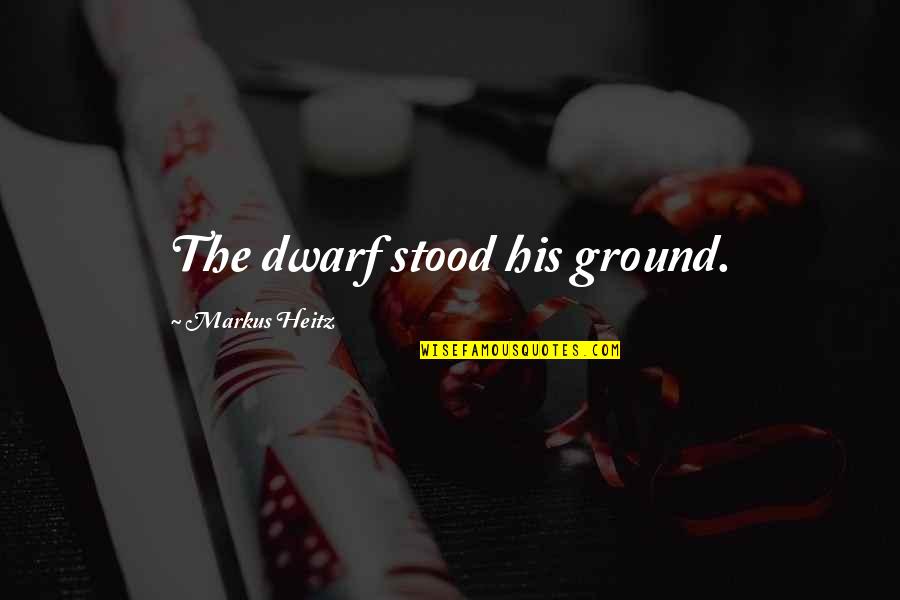 Hoeler Plumbing Quotes By Markus Heitz: The dwarf stood his ground.