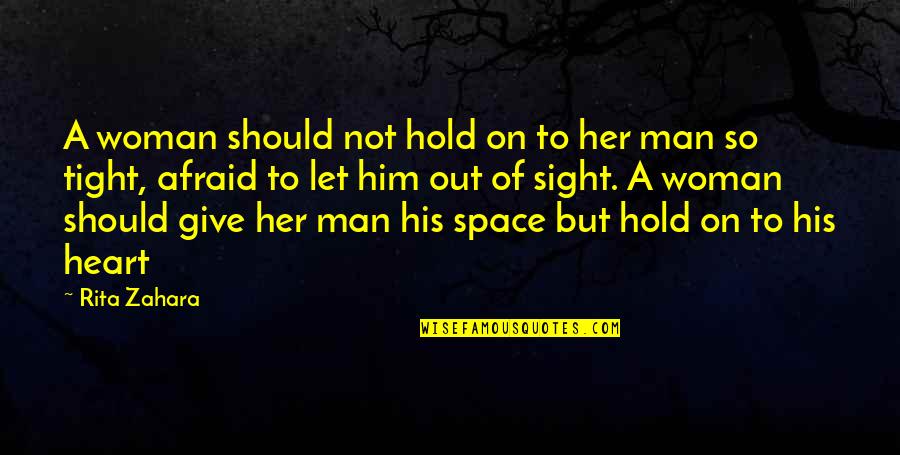 Hold Him Tight Quotes By Rita Zahara: A woman should not hold on to her