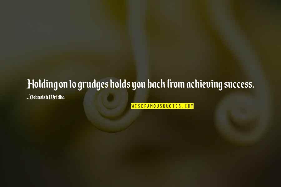 Holding Back Quotes By Debasish Mridha: Holding on to grudges holds you back from