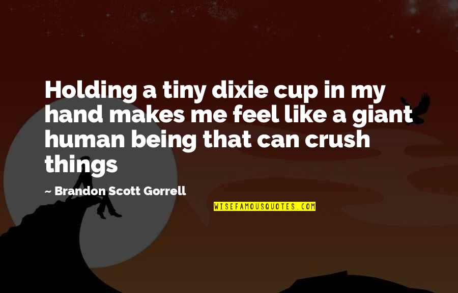 Holding Hand Quotes By Brandon Scott Gorrell: Holding a tiny dixie cup in my hand