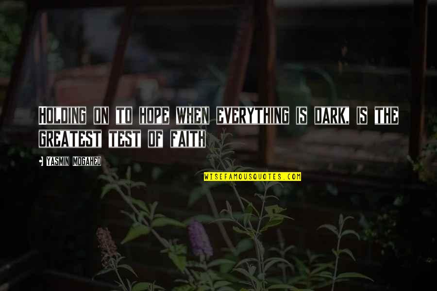 Holding On To My Faith Quotes By Yasmin Mogahed: Holding on to hope when everything is dark,